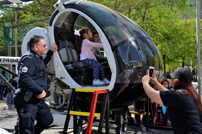 Armed Security in Chicago - security guard taking care of children for event security